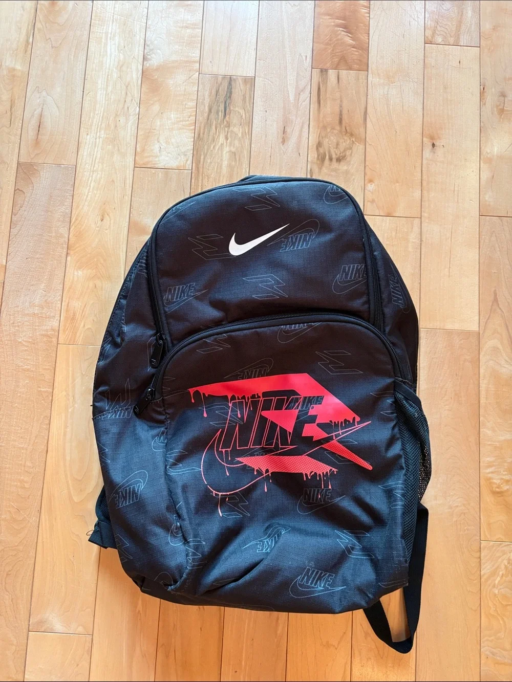 Nike Black Backpack with Red Graphic Logo